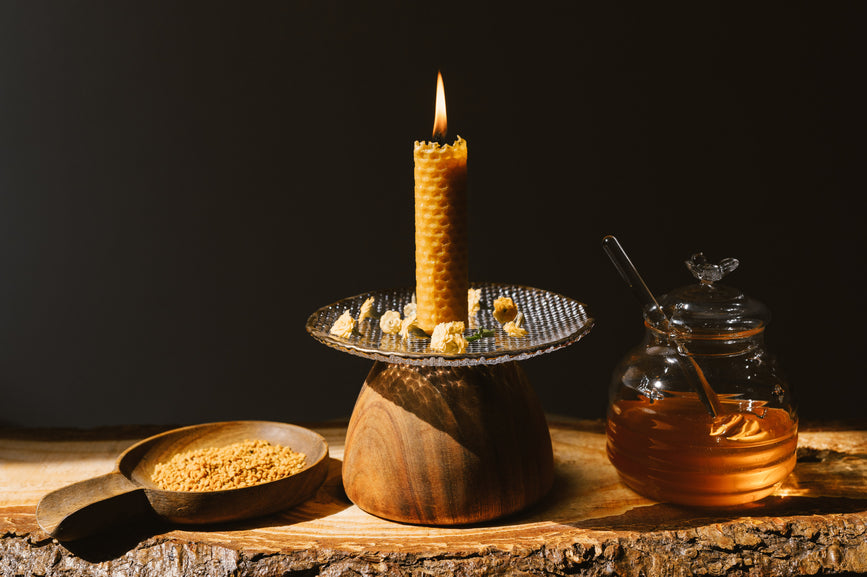 Scene with candle and honey
