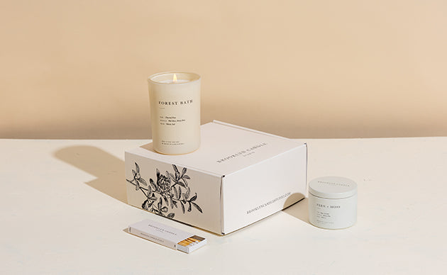 Candle of the Month Deluxe featuring two candles and a match box